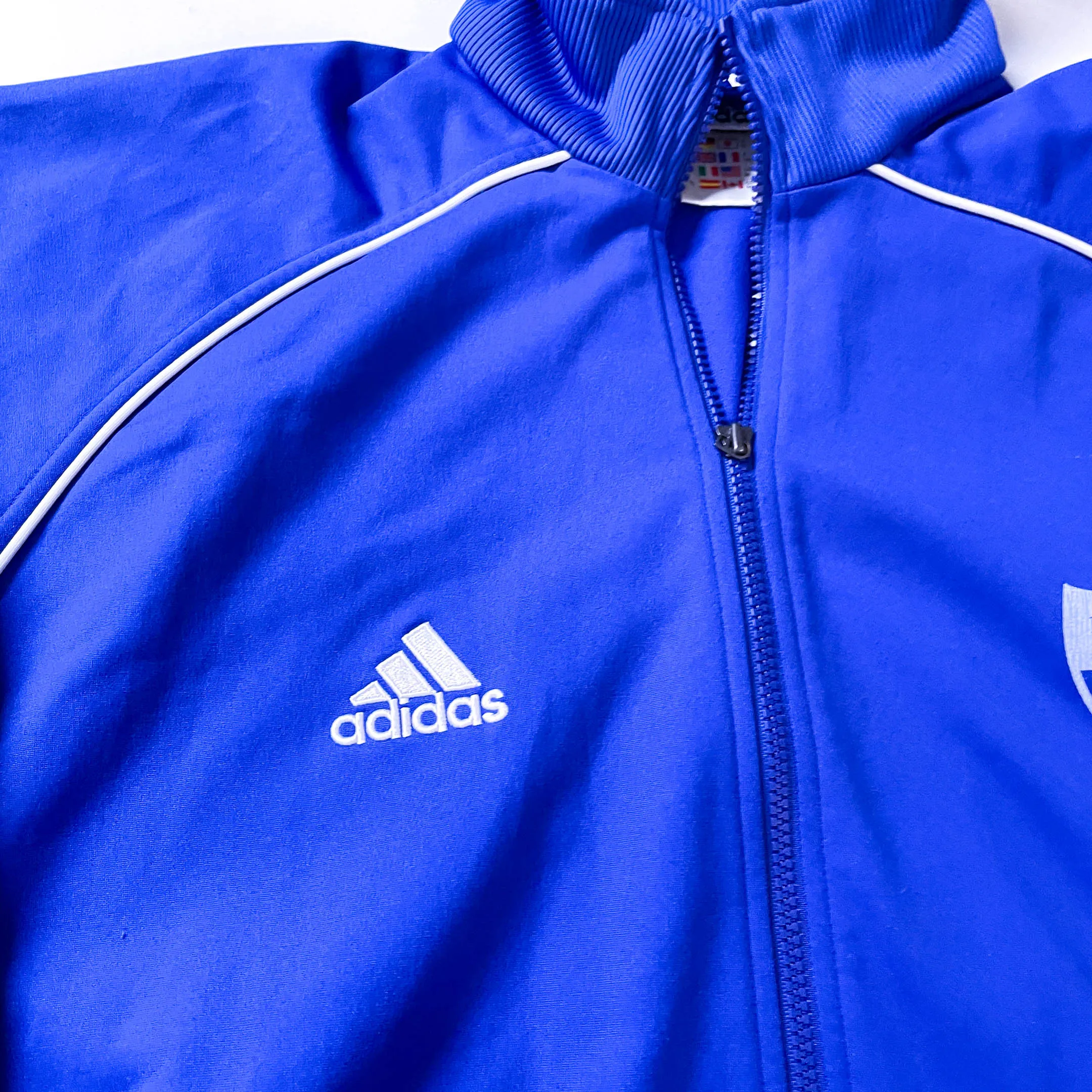 Vintage Adidas blue full zip track top in M|L31 W 25| SKU 3863